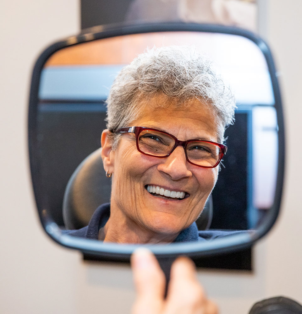 lila mirror in hand