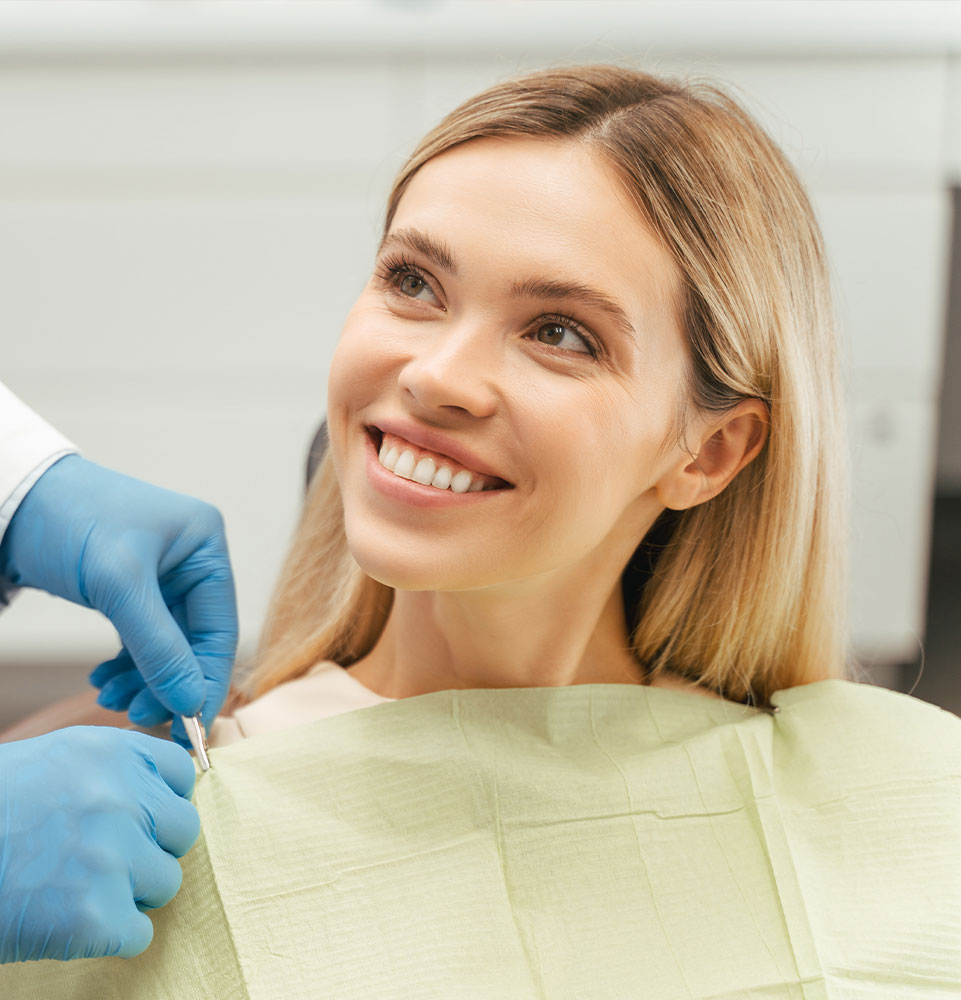 patient getting prep and ready for their dental treatment