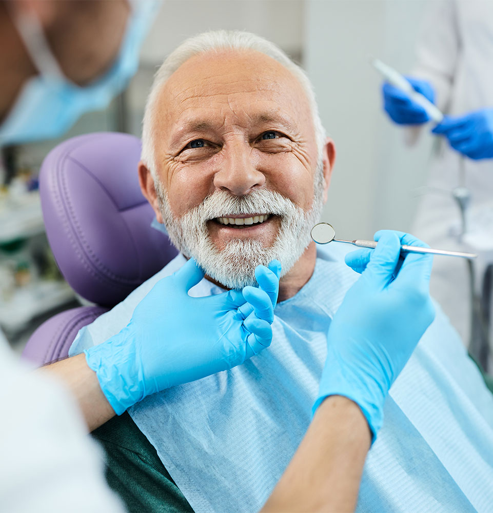 male patient being examined for their dental implant procedure