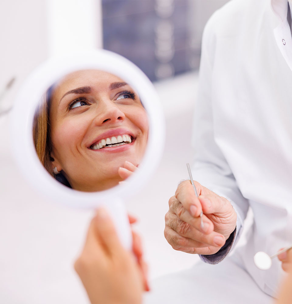 patient smiling brightly after their dental procedure